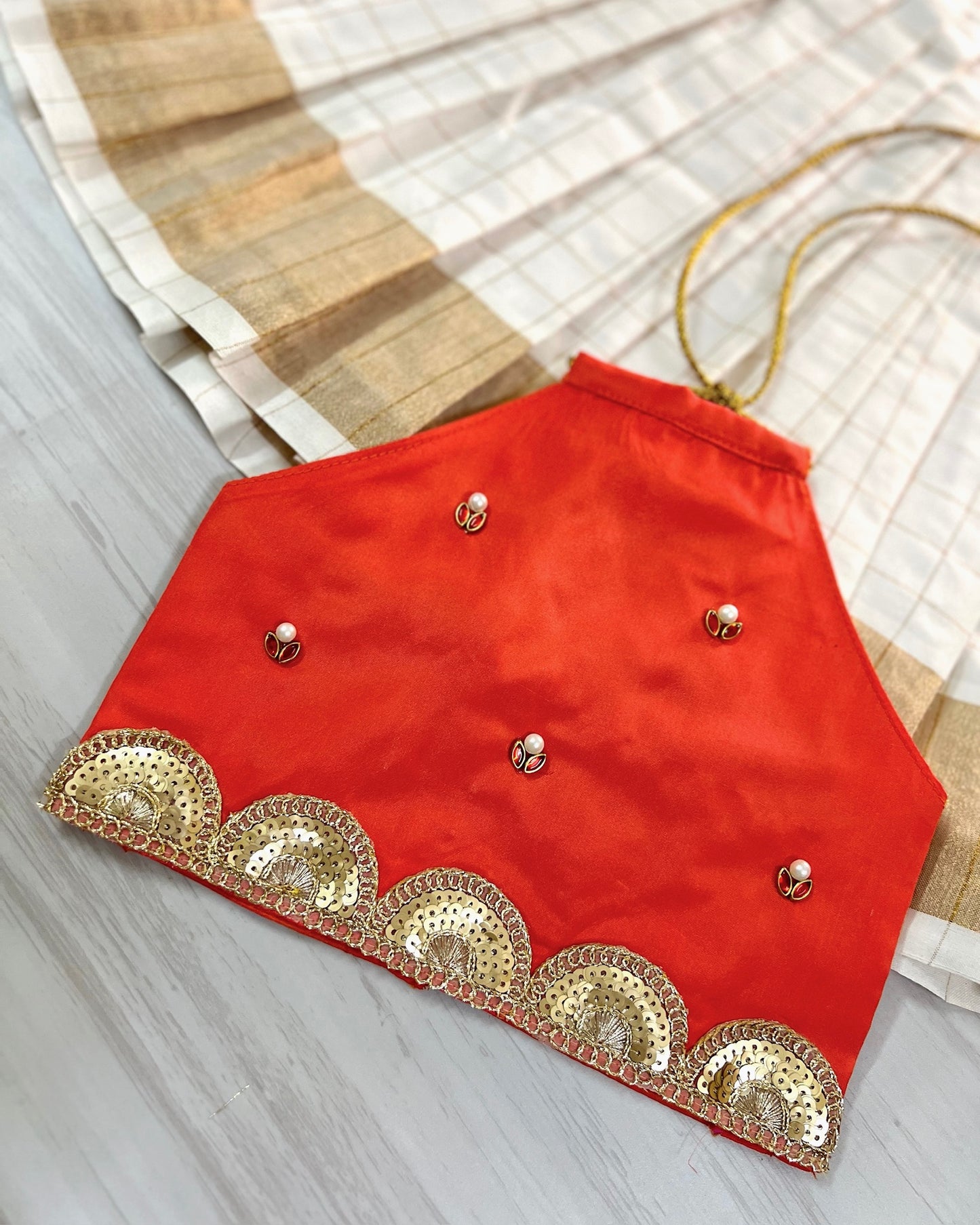 Fire Orange Halter Neck Top With White Cotton Pleated Skirt | The Silkberry