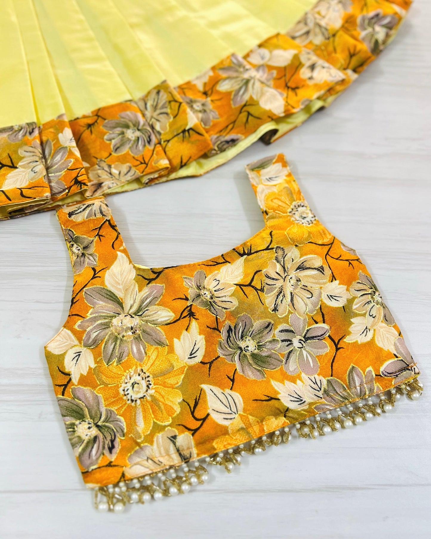 Autumn Glow Cute Bow Top With Hanging Pearls Lehenga Set | The Silkberry