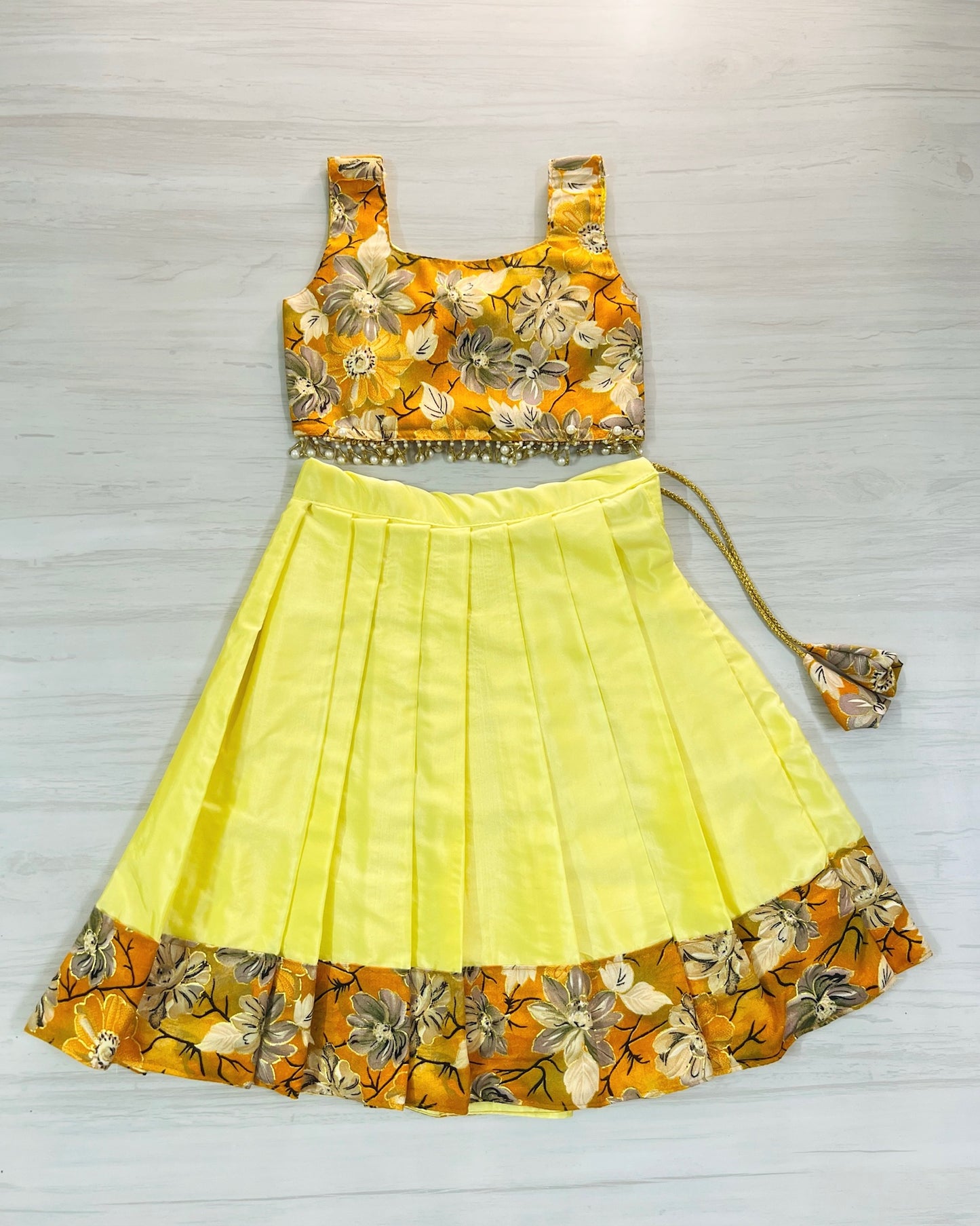 Autumn Glow Cute Bow Top With Hanging Pearls Lehenga Set | The Silkberry