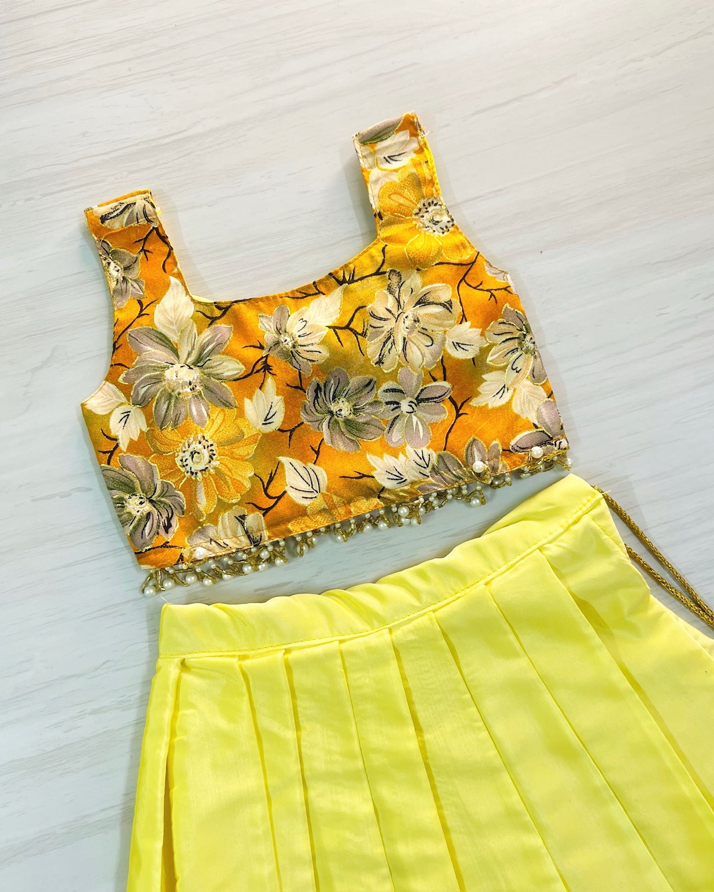 Autumn Glow Cute Bow Top With Hanging Pearls Lehenga Set | The Silkberry
