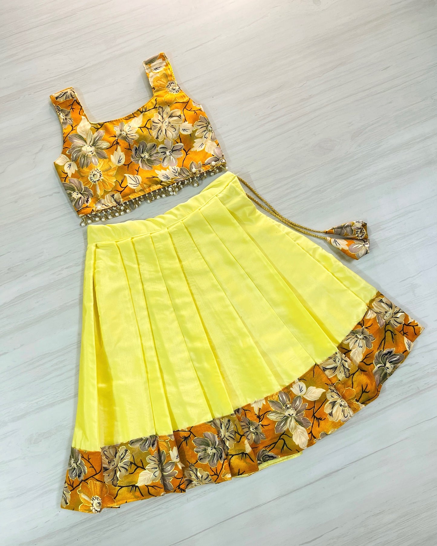 Autumn Glow Cute Bow Top With Hanging Pearls Lehenga Set | The Silkberry