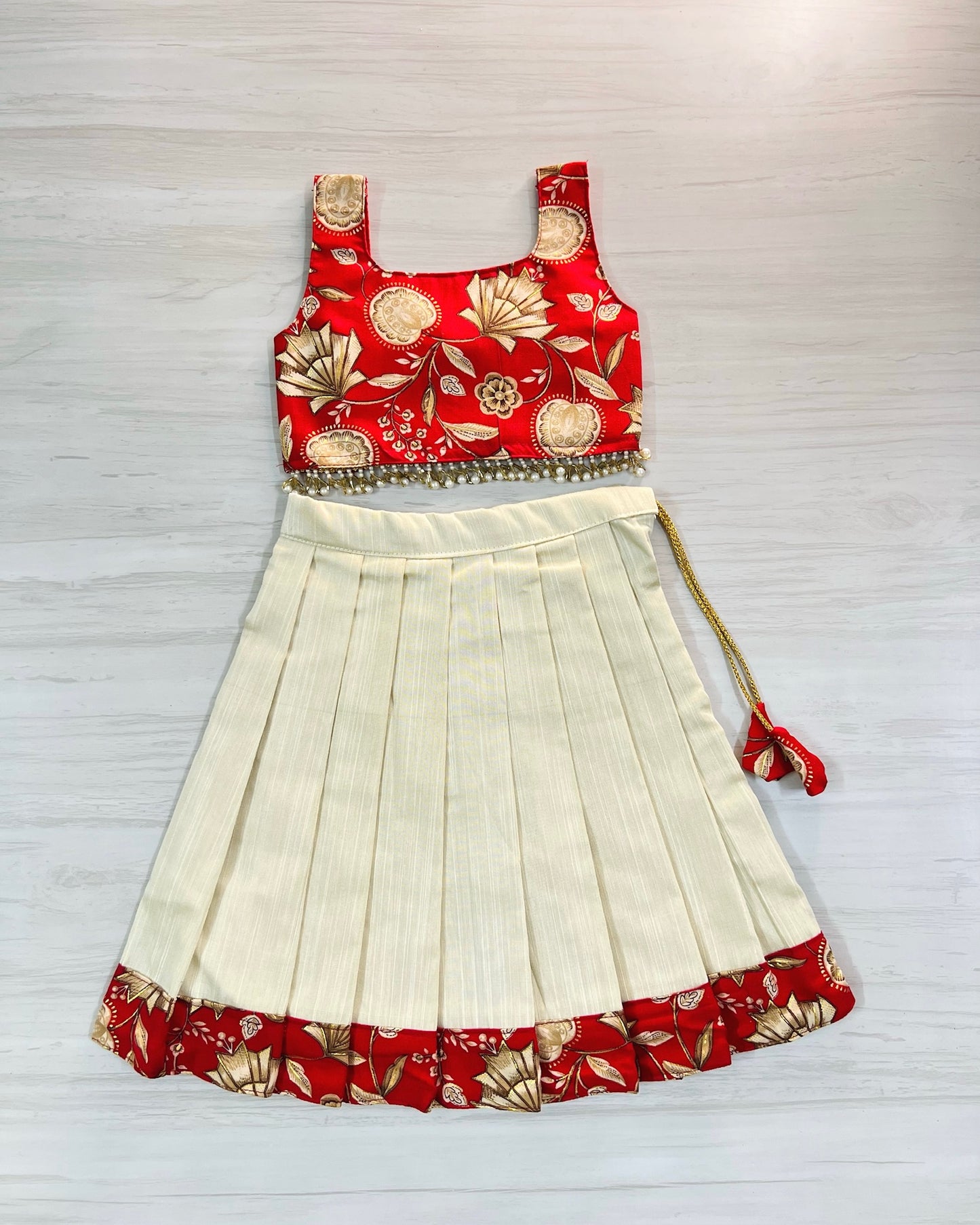 Scarlet Beauty Cute Bow Top With Hanging Pearls Lehenga Set | The Silkberry