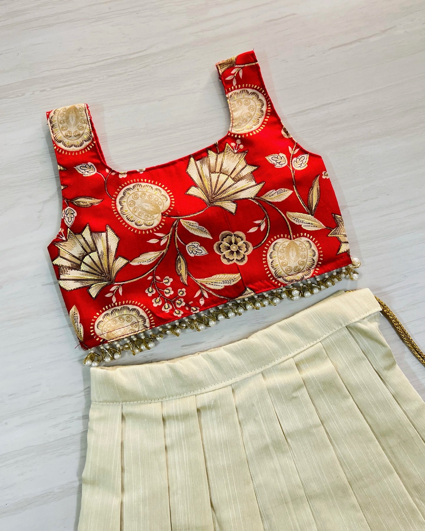Scarlet Beauty Cute Bow Top With Hanging Pearls Lehenga Set | The Silkberry