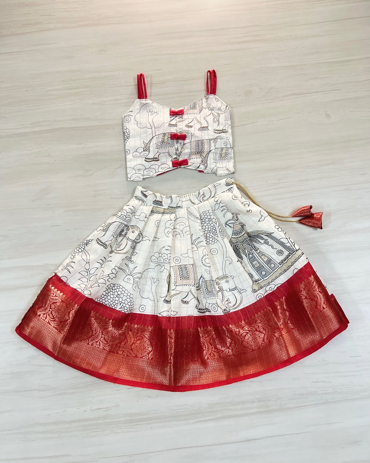 Porcelain White With Cute Red Bows Tie-Up Lehenga Set