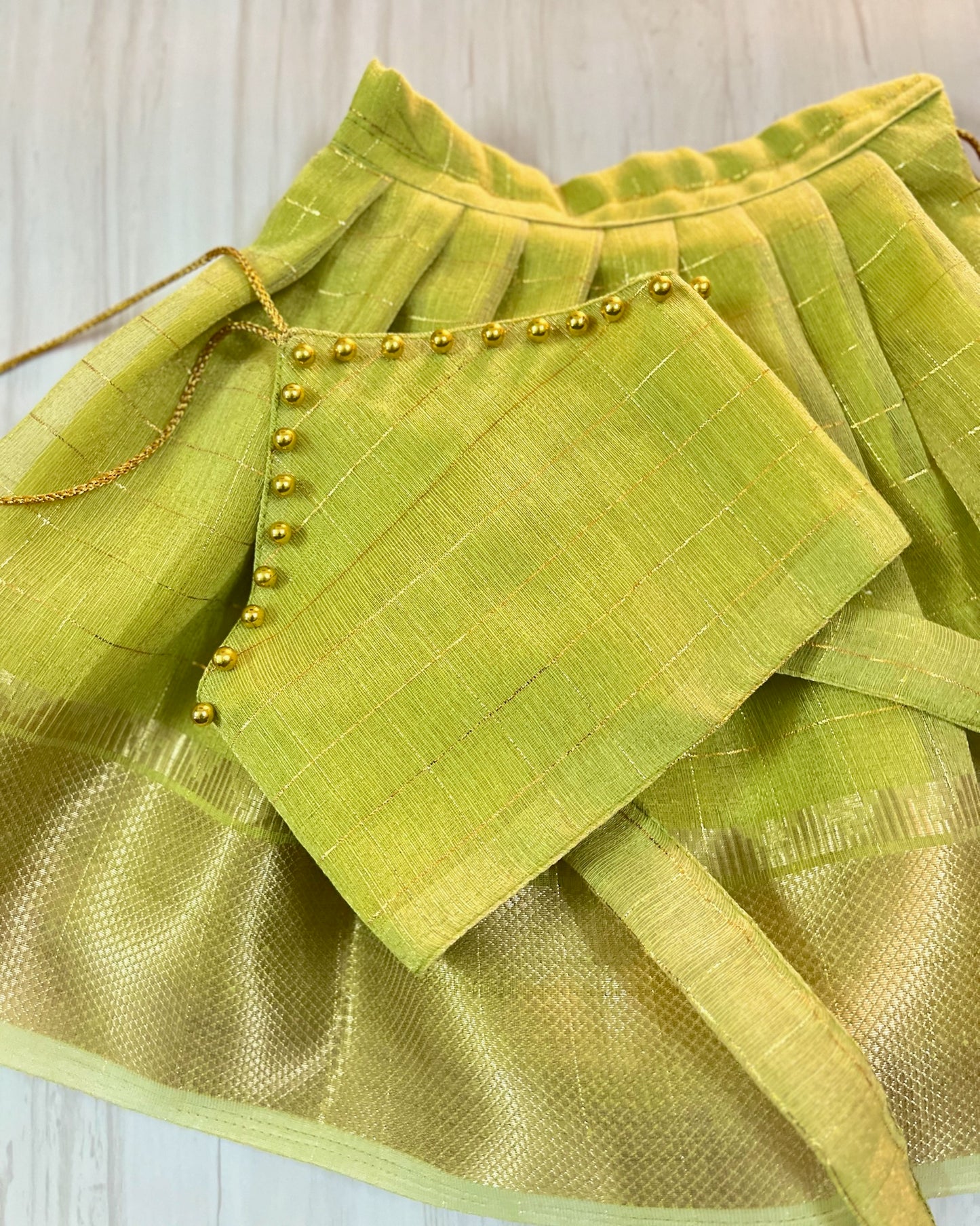 Spring Bud Green Halter Neck Tissue Silk Lehenga Set