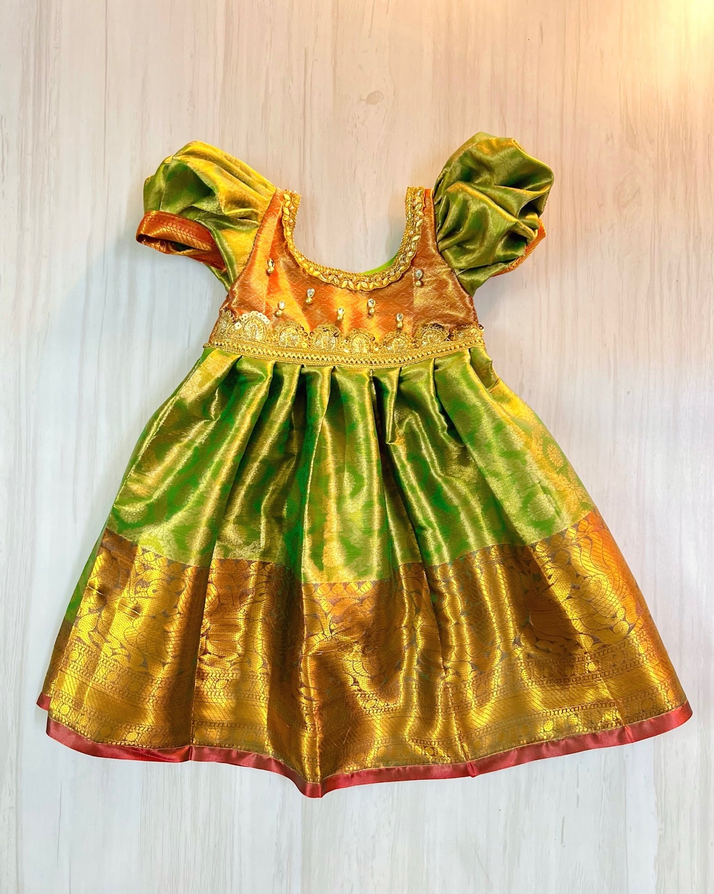 Light Green And Orange Grand Stone Work Silk Gown