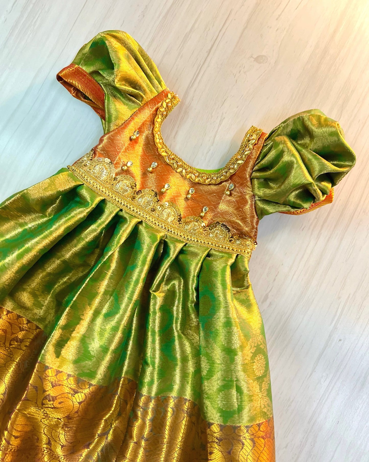 Light Green And Orange Grand Stone Work Silk Gown