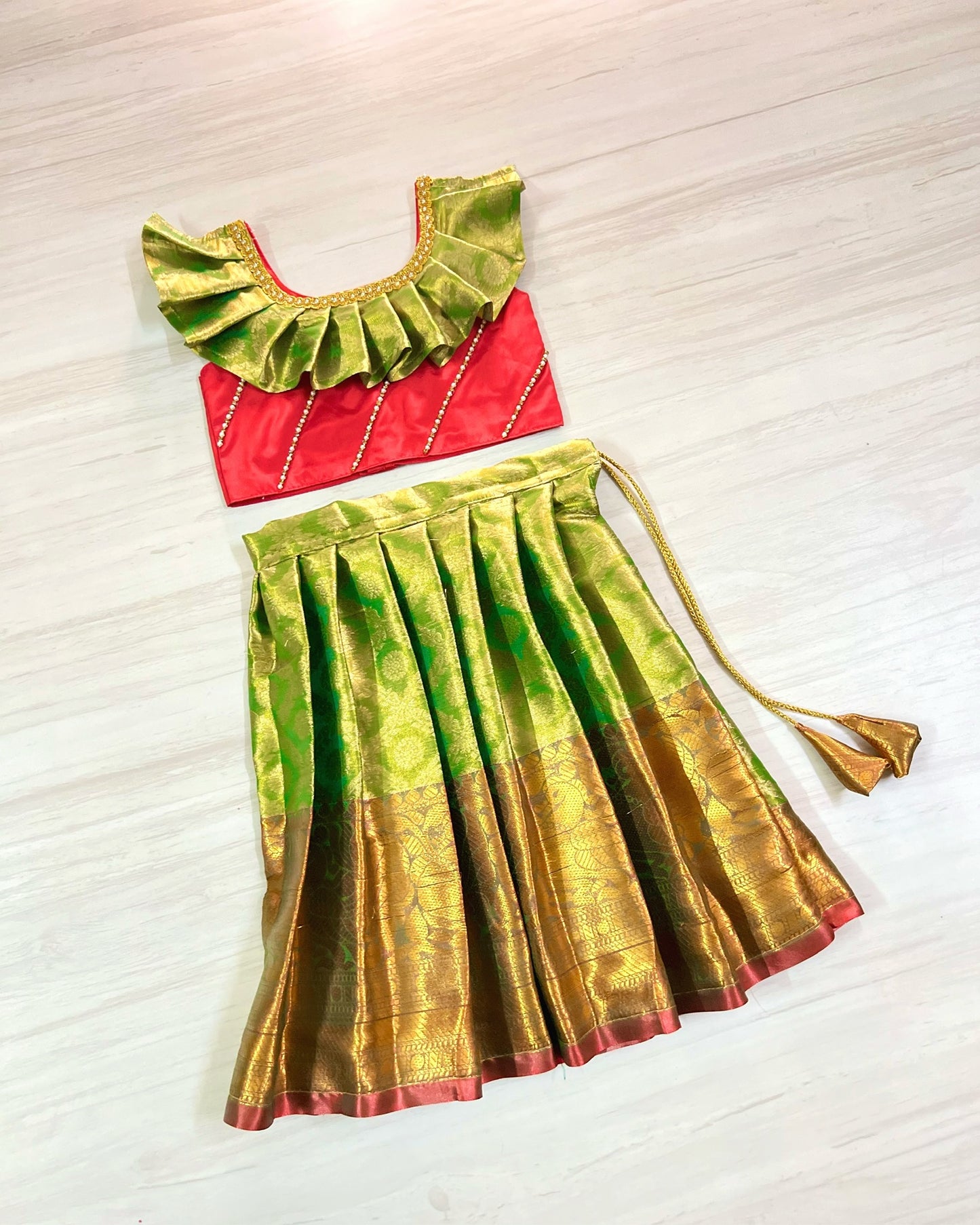 Cherry Red And Light Green Stone Embellished Pleated Silk Lehenga Set