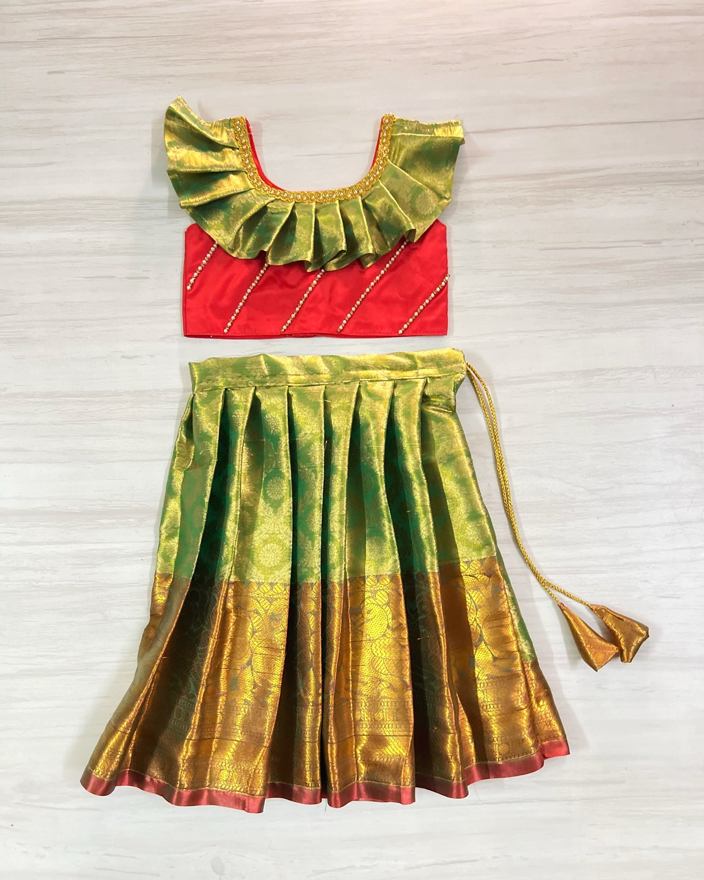 Cherry Red And Light Green Stone Embellished Pleated Silk Lehenga Set
