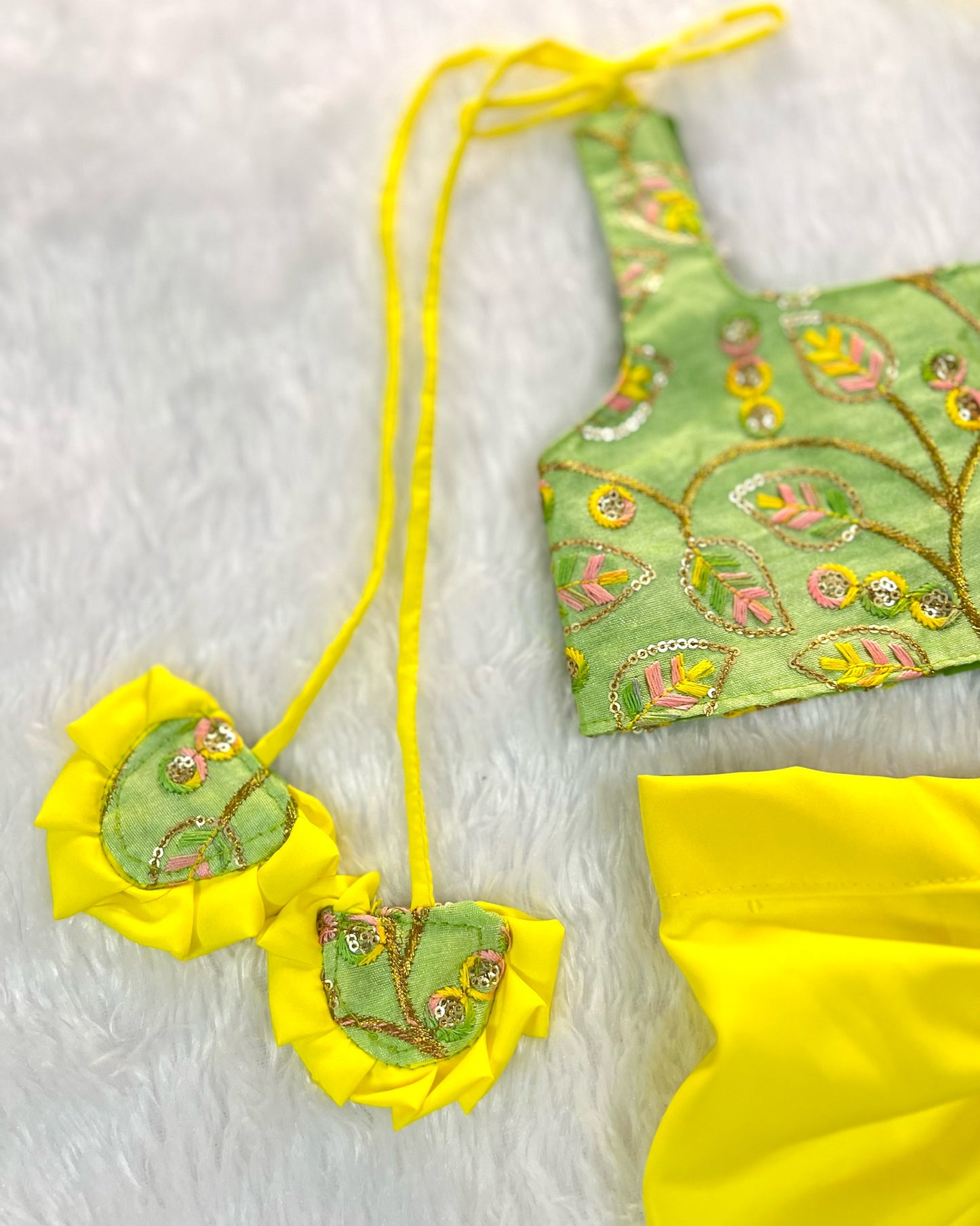 Pistachio Green Embroidered Top And Bright Yellow Dhoti Skirt
