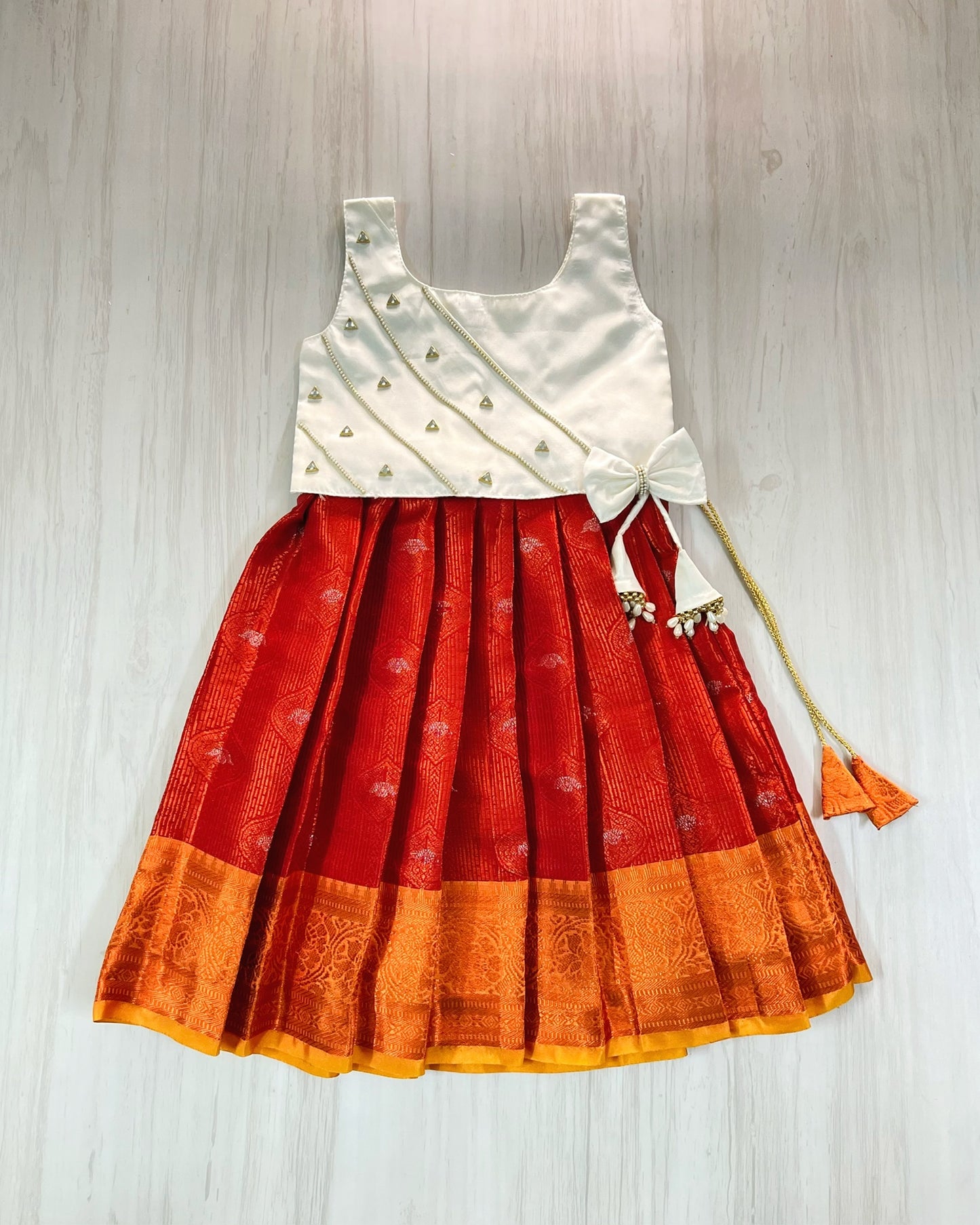 Pure White Embellished Top And Chilli Red Silk Skirt Lehenga Set