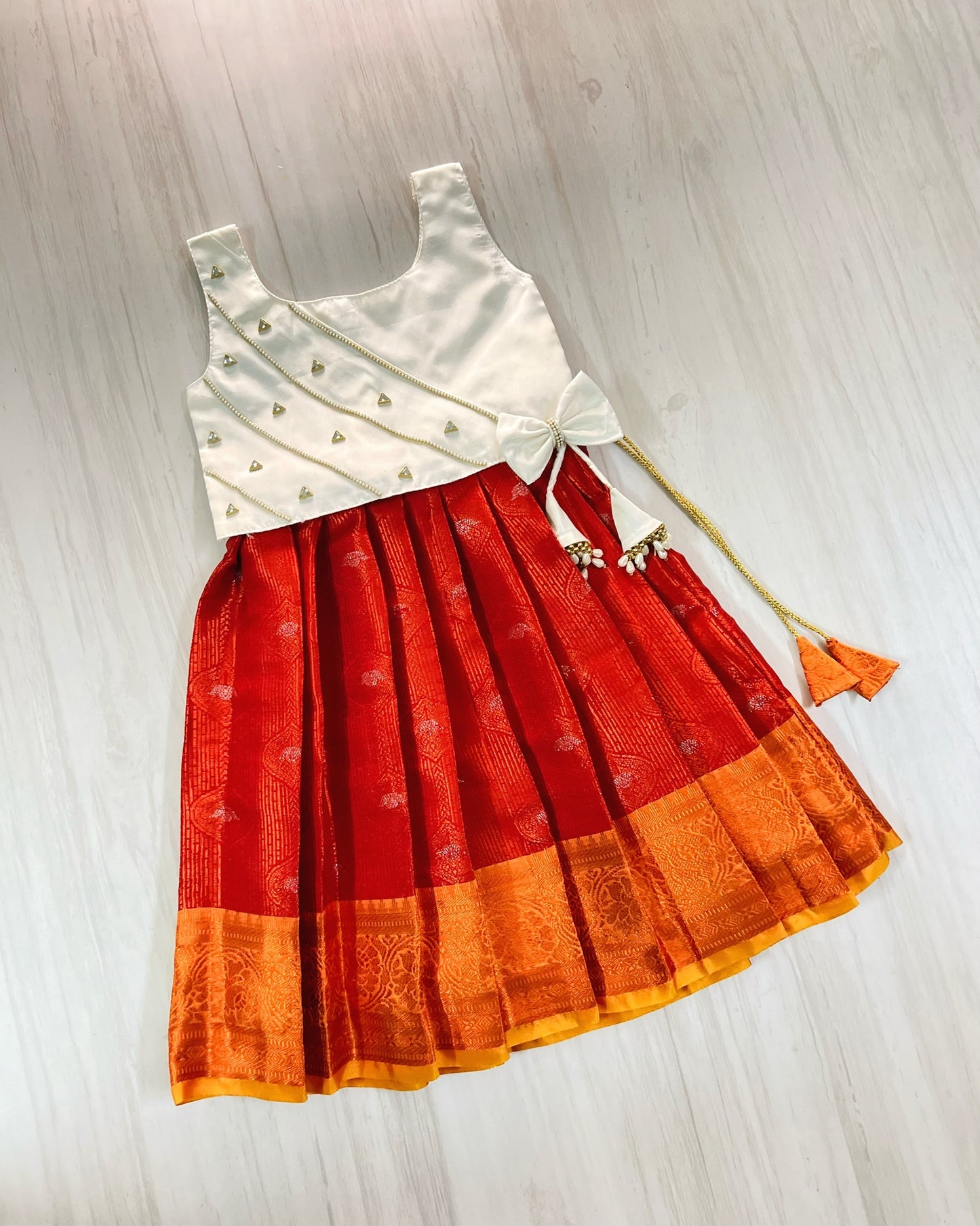 Pure White Embellished Top And Chilli Red Silk Skirt Lehenga Set