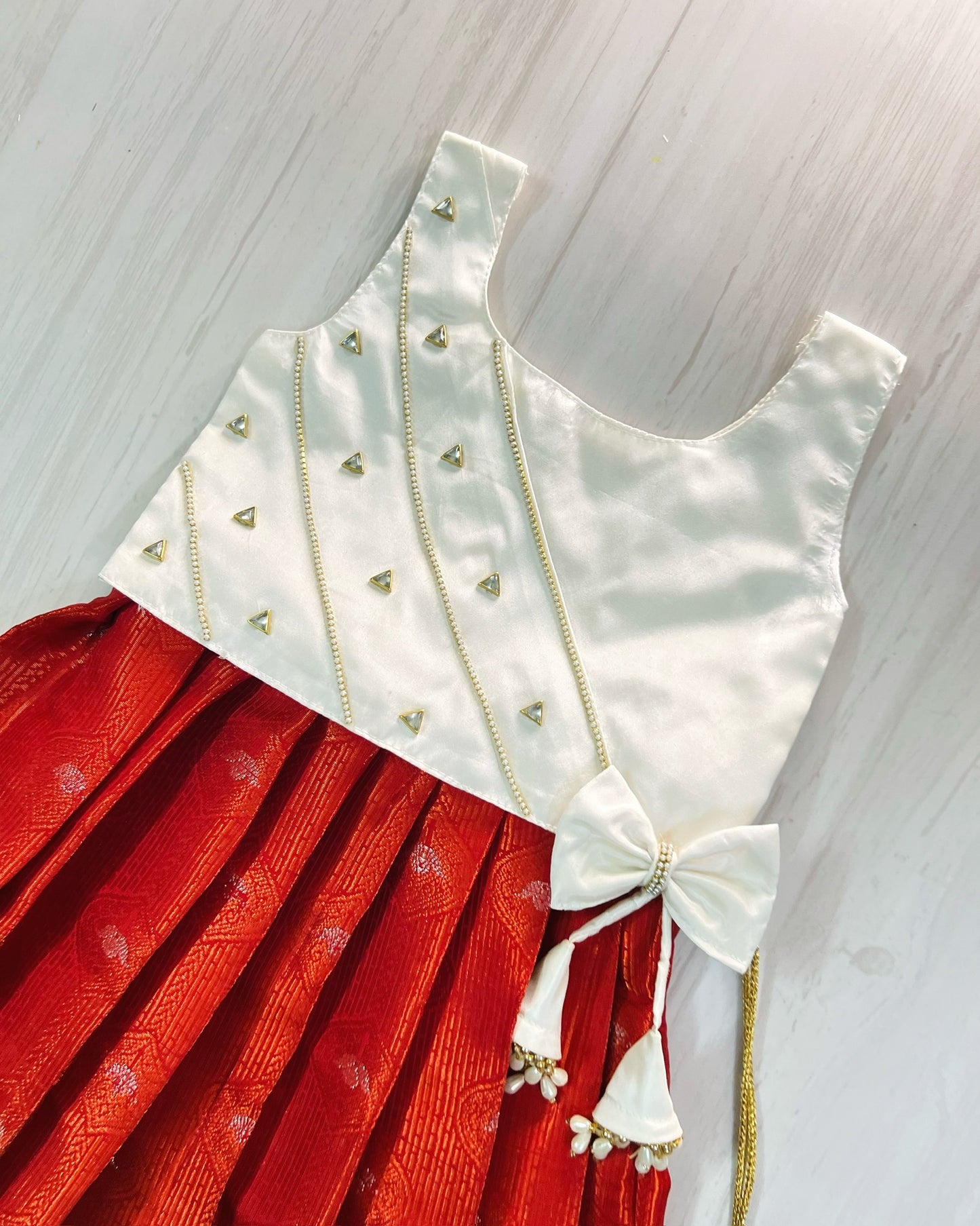 Pure White Embellished Top And Chilli Red Silk Skirt Lehenga Set