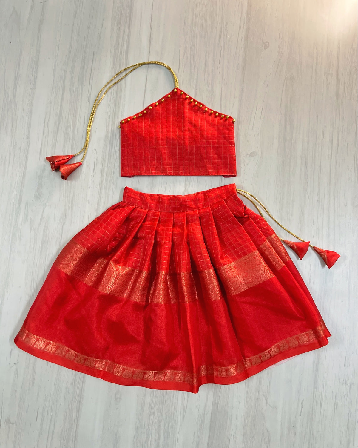 Chili Red Halter Neck Golden Pearls Silk Lehenga Set