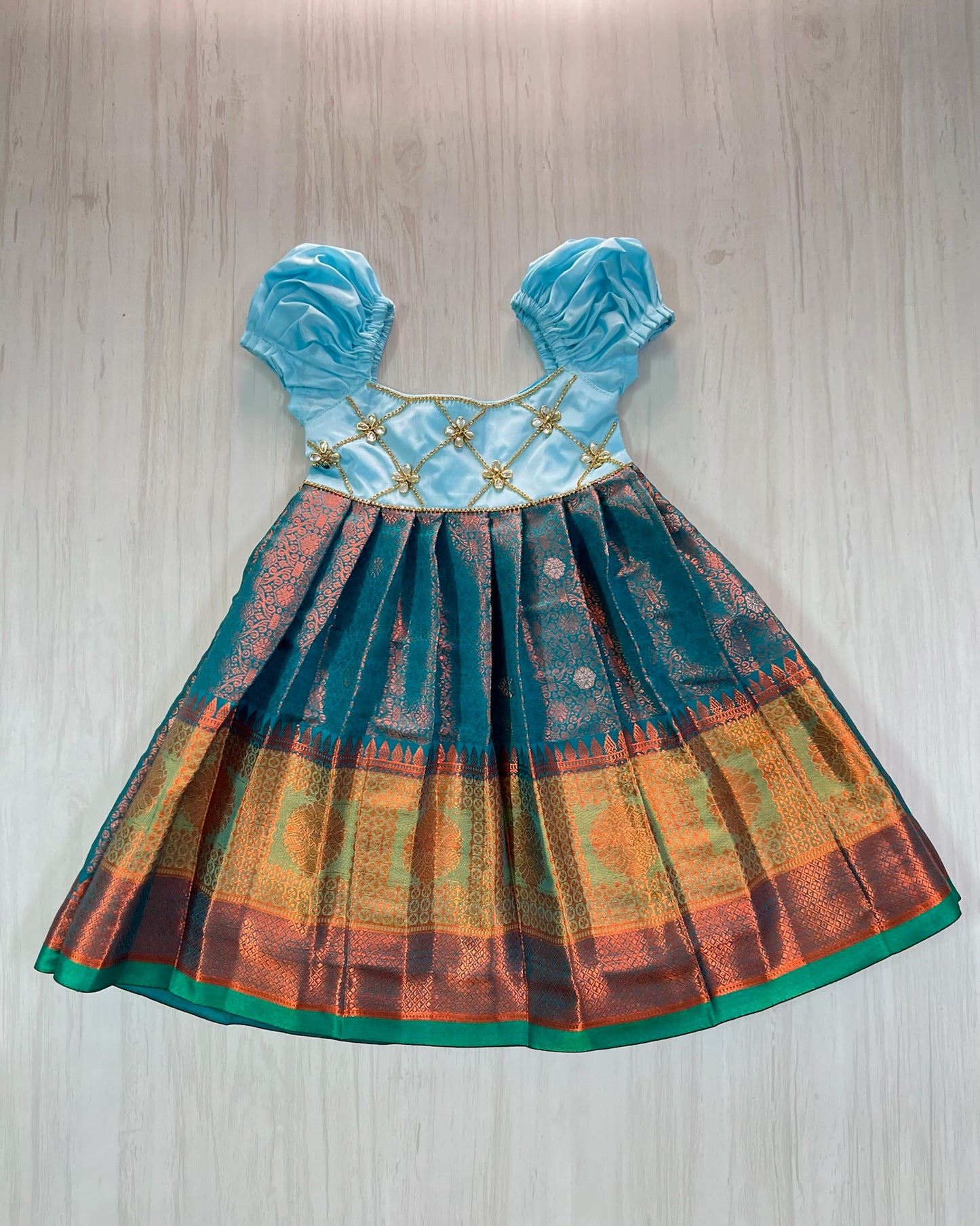 Sky Blue Criss Cross Stone Work Top With Teal Gown