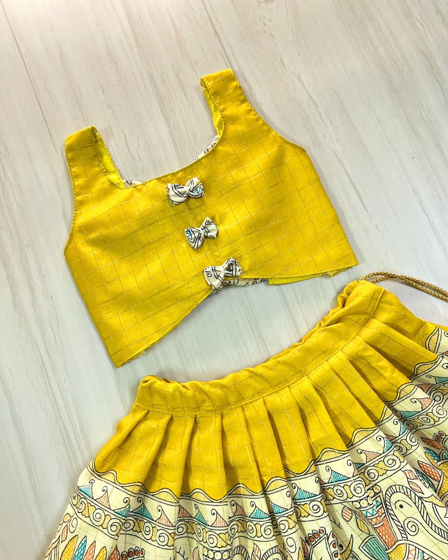 Breezy Yellow Cute Bow Tie Up Top With Pichwai Print Skirt