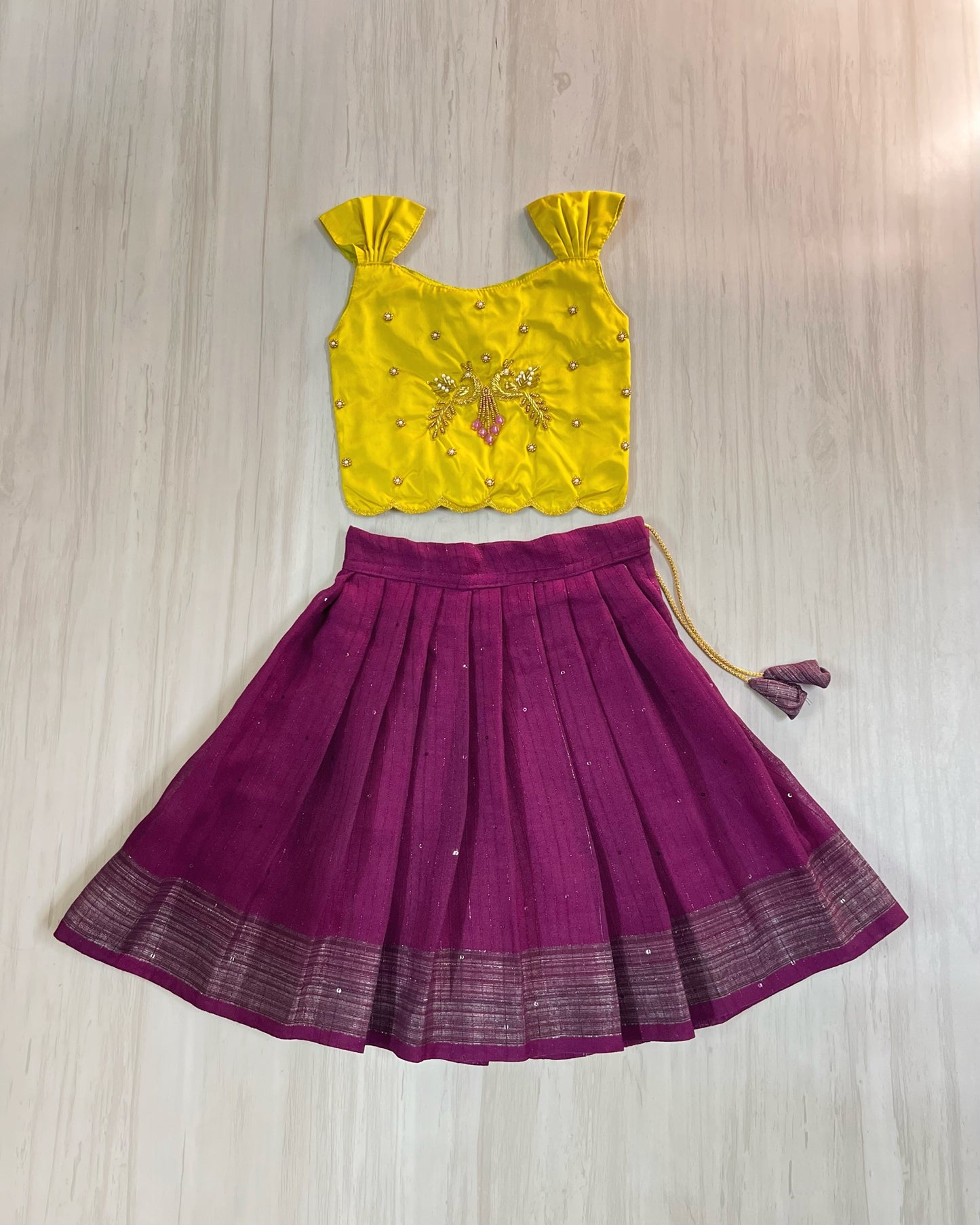 Saffron Yellow Peacock Embroidered Aari Work Cute Top With Plum Lehenga Set | The Silkberry