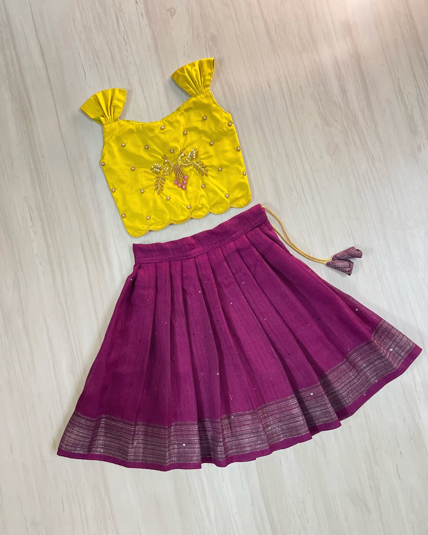 Saffron Yellow Peacock Embroidered Aari Work Cute Top With Plum Lehenga Set | The Silkberry