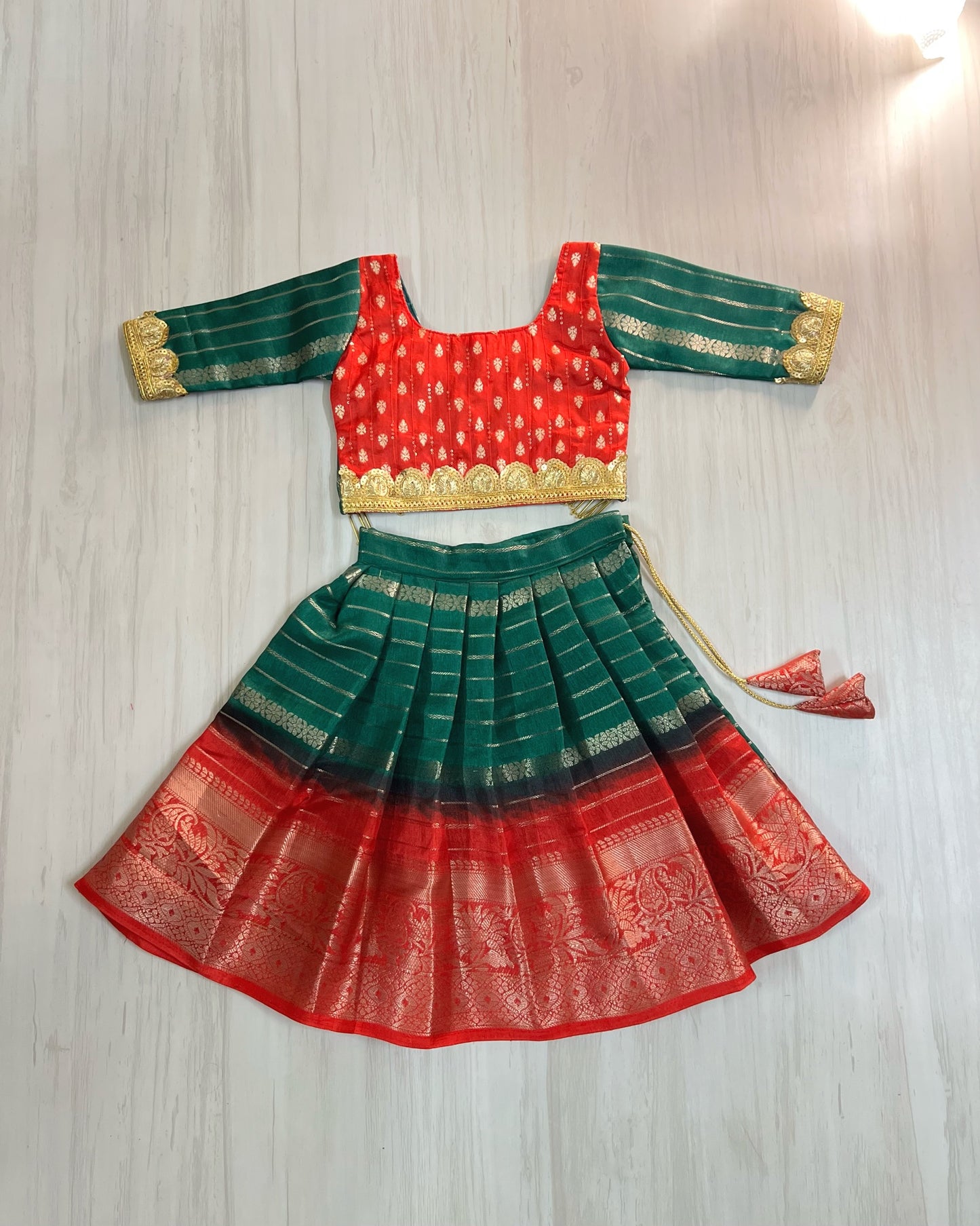 Vermillion Red With Dark Green Modern Back Golden Hangings Lehenga