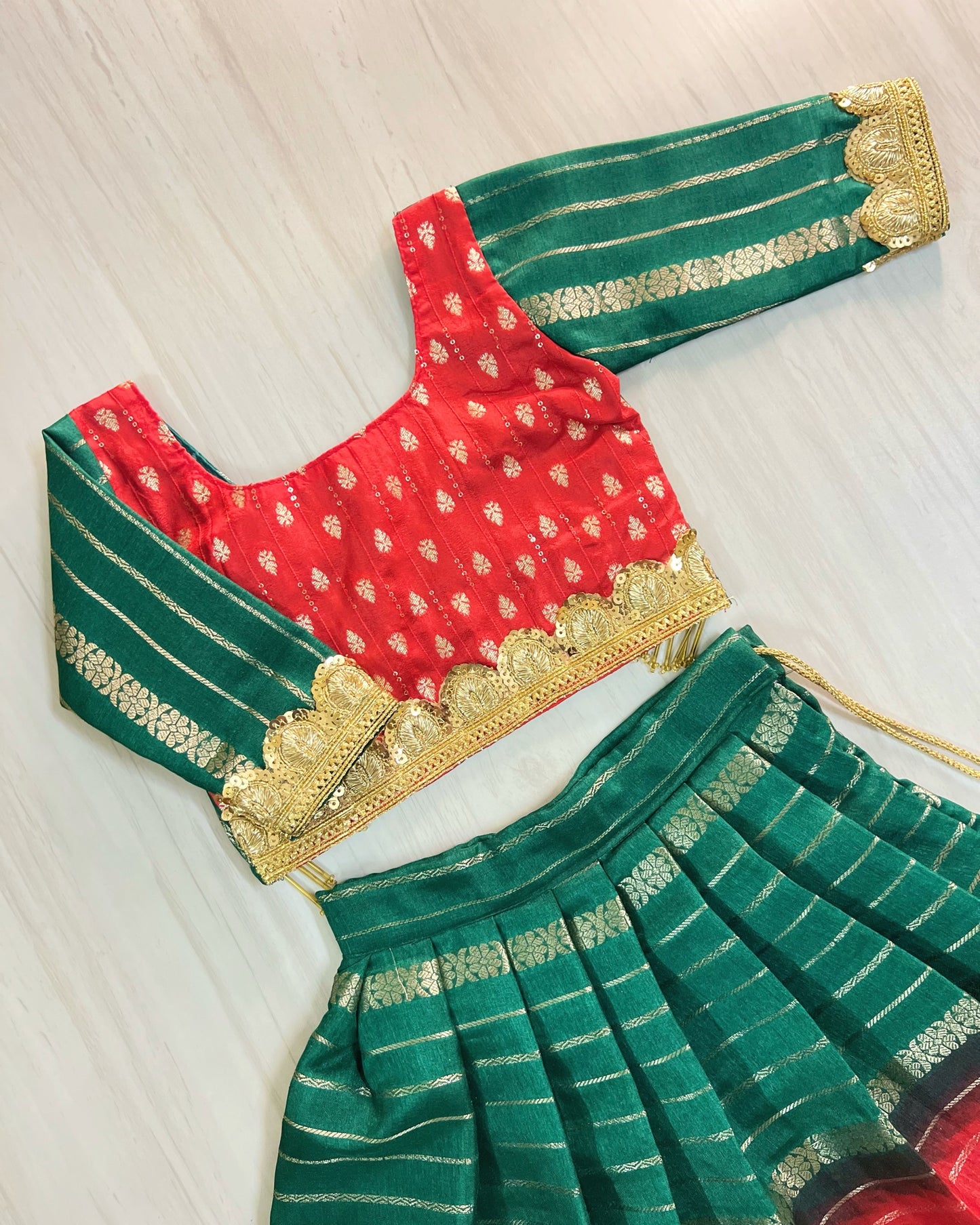 Vermillion Red With Dark Green Modern Back Golden Hangings Lehenga
