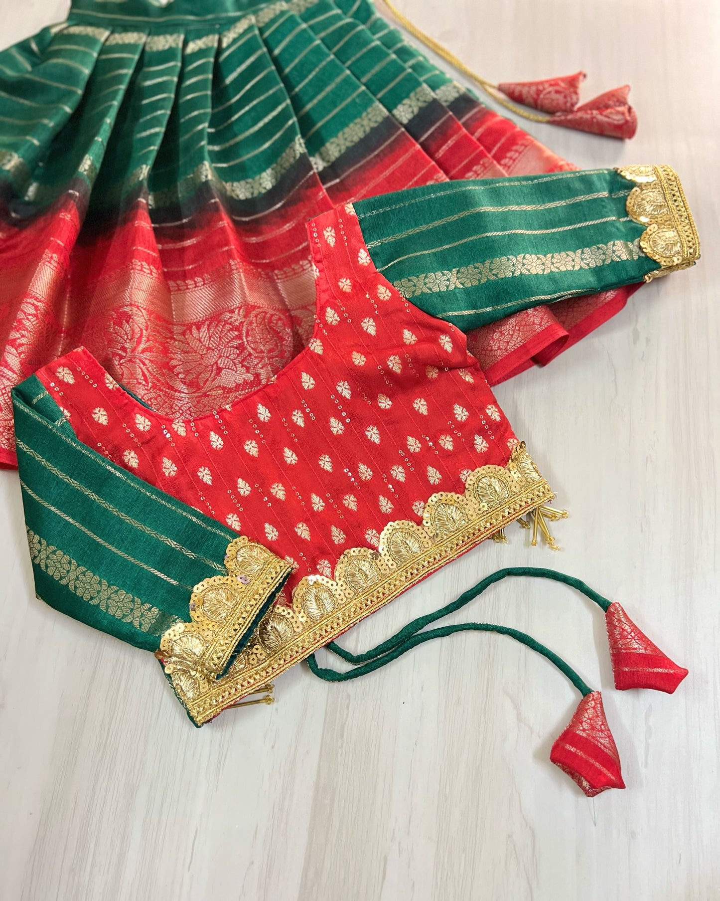 Vermillion Red With Dark Green Modern Back Golden Hangings Lehenga