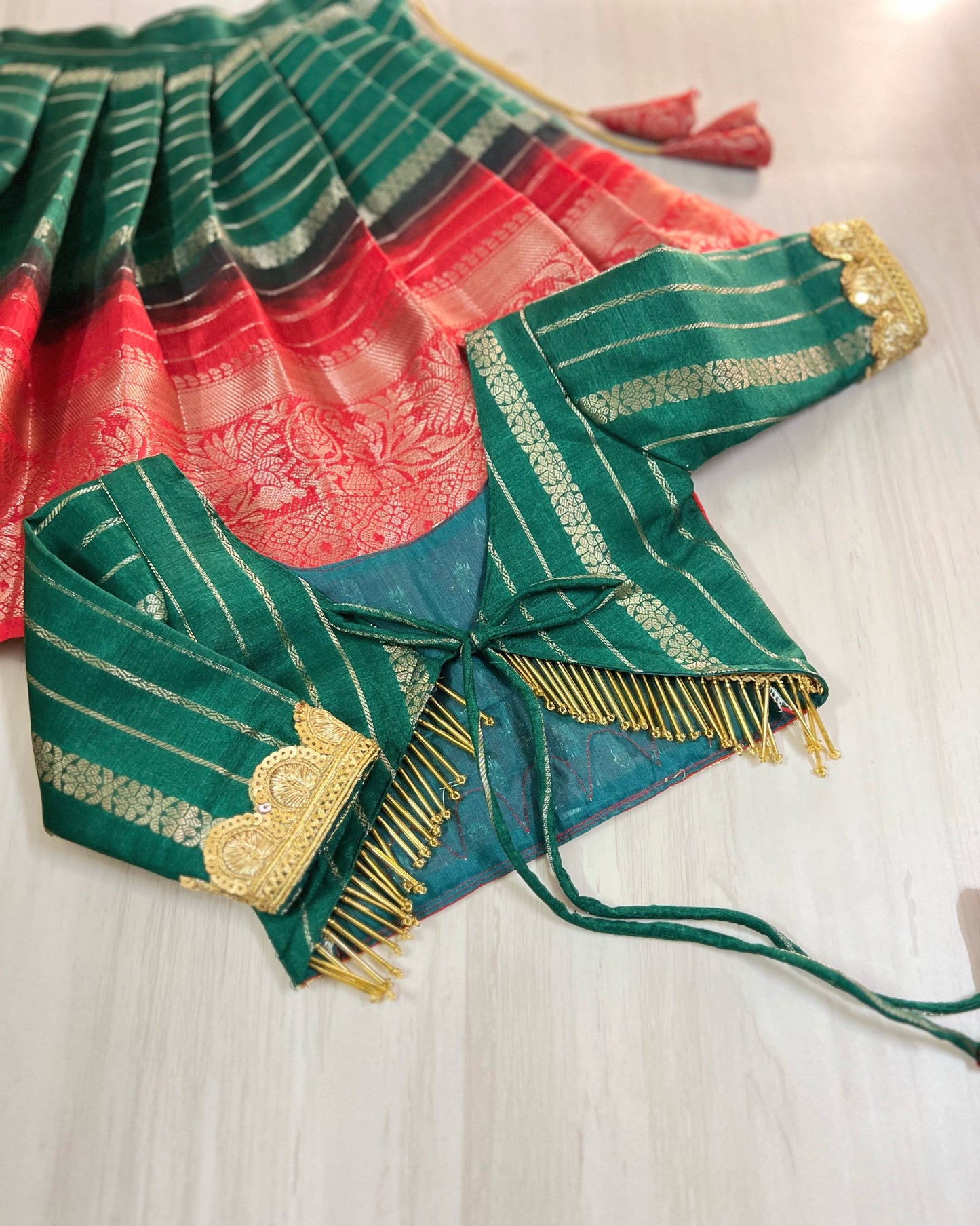 Vermillion Red With Dark Green Modern Back Golden Hangings Lehenga