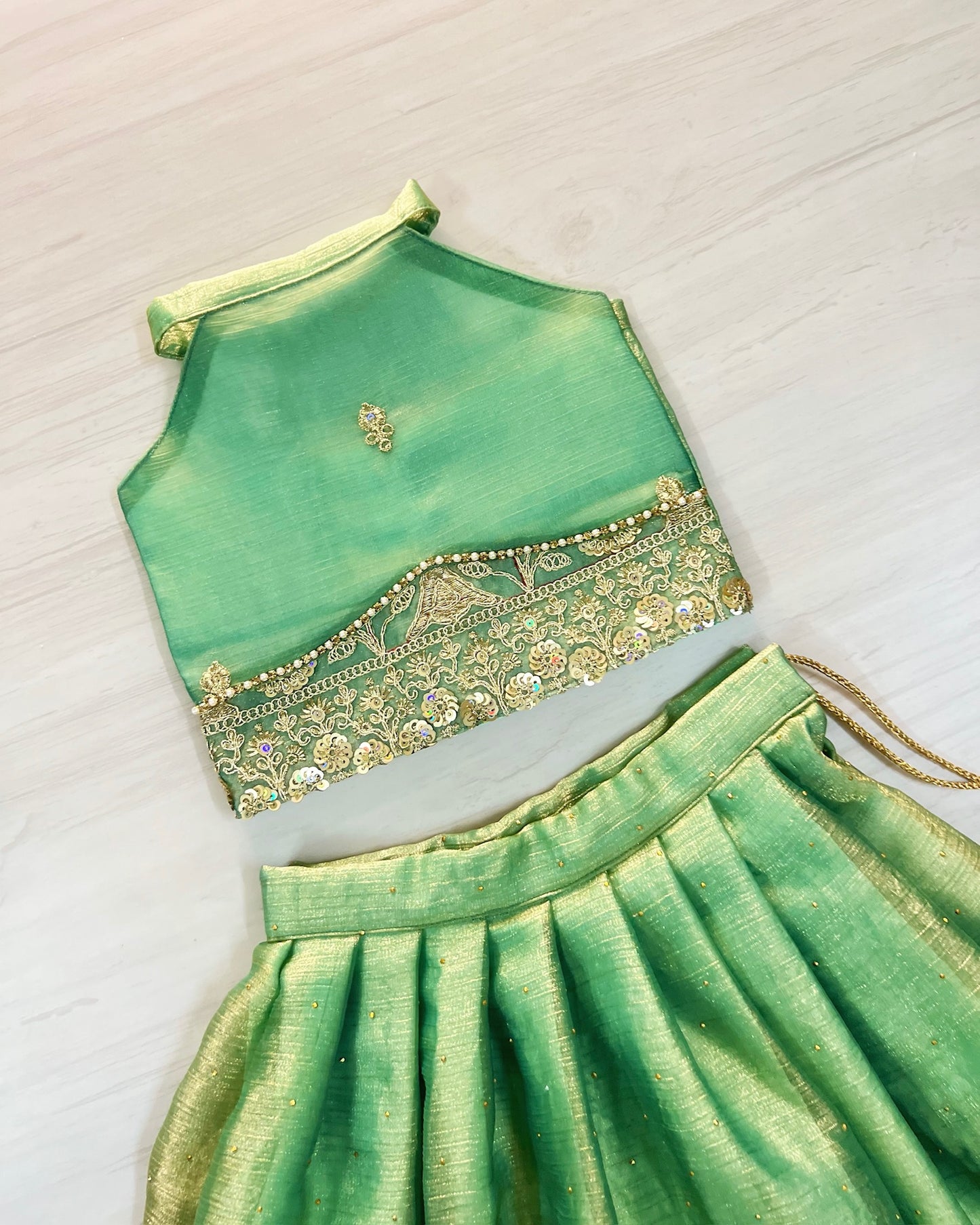 Cool Turquoise Intricate Embroidered Halter Neck Lehenga Set