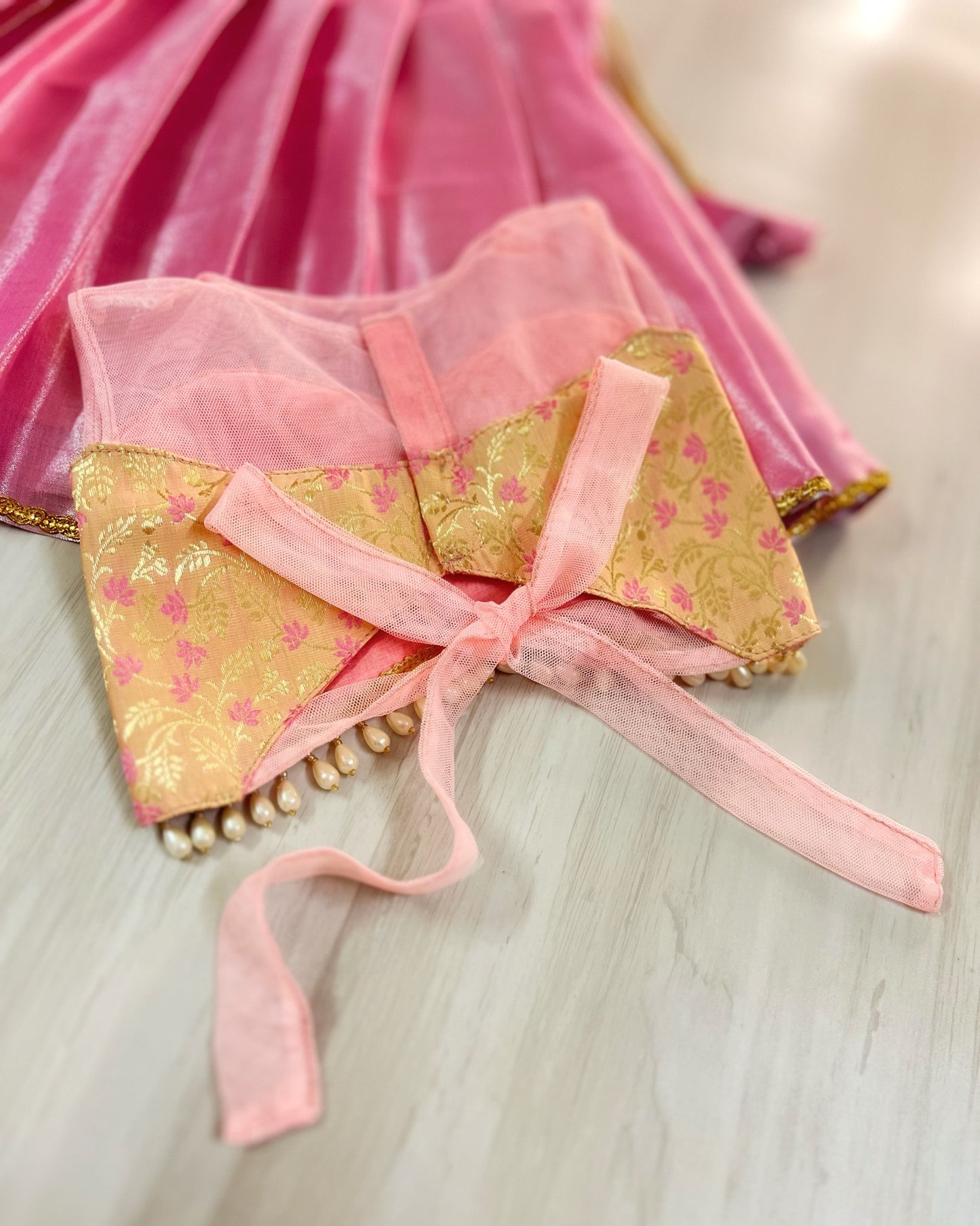 Cherry Blossom Pink Netted Brocade Silk Top With Baby Pink Lehenga