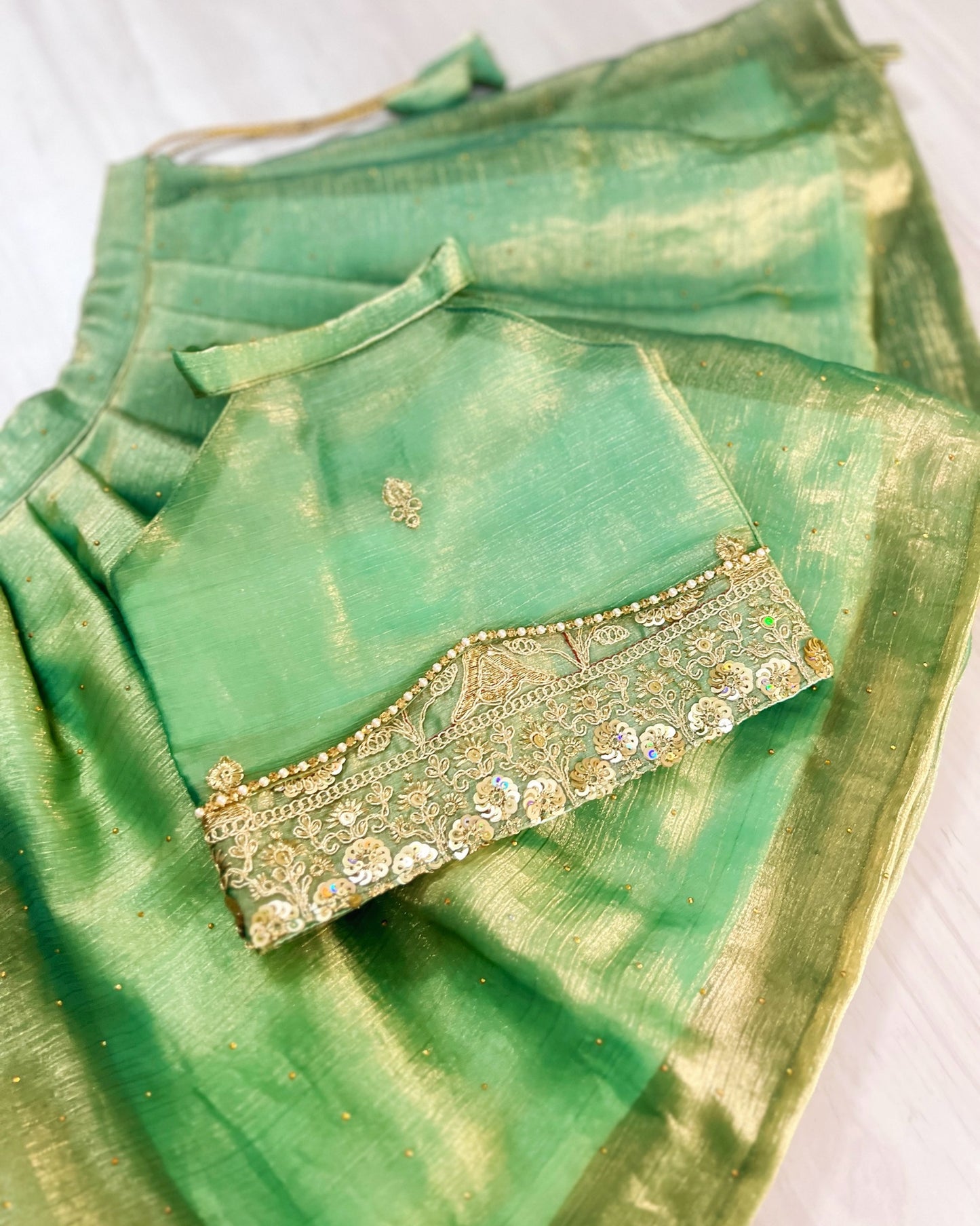 Cool Turquoise Intricate Embroidered Halter Neck Lehenga Set