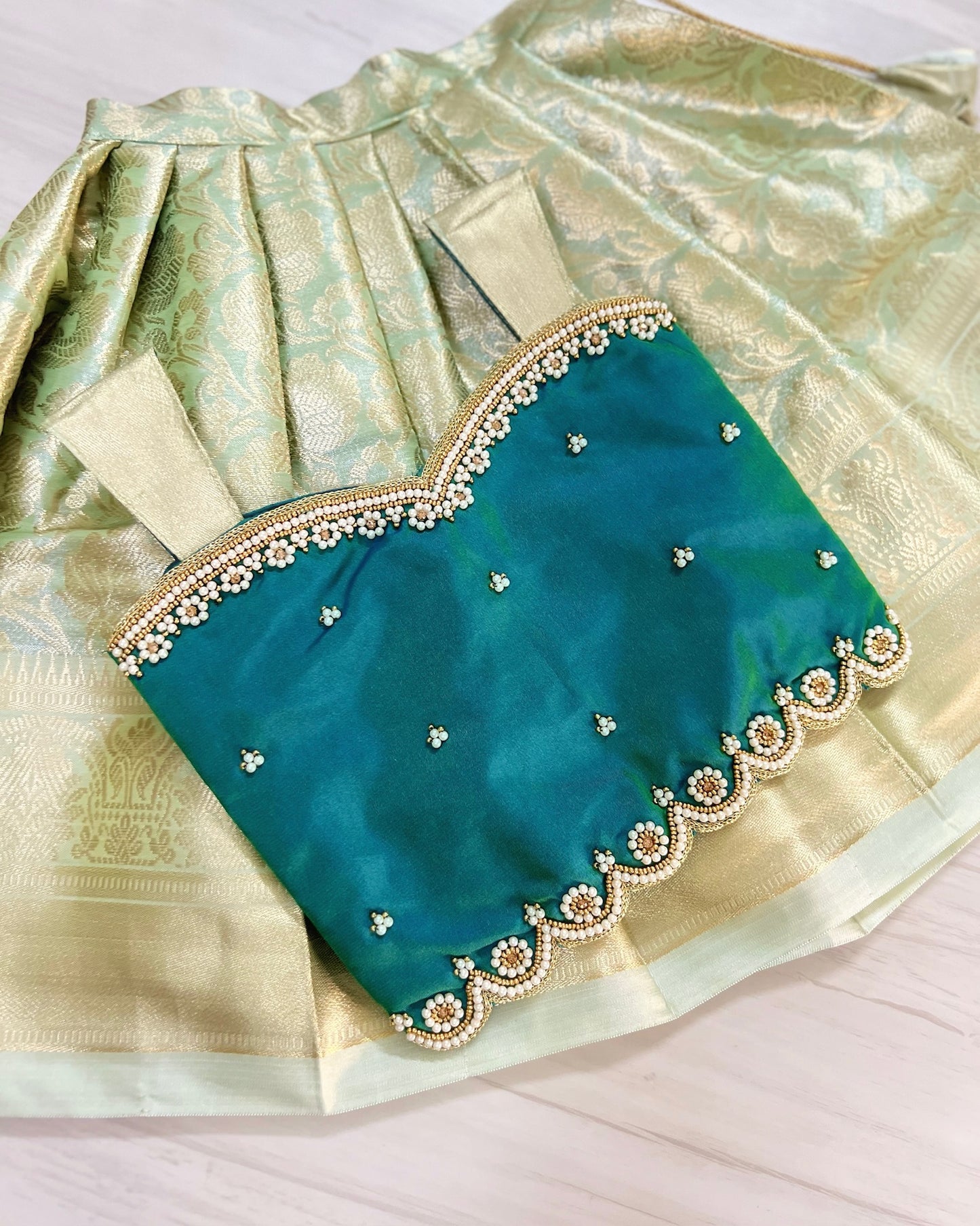 Carribean Teal Pearl Embellished Intricate Aari Work Lehenga Set