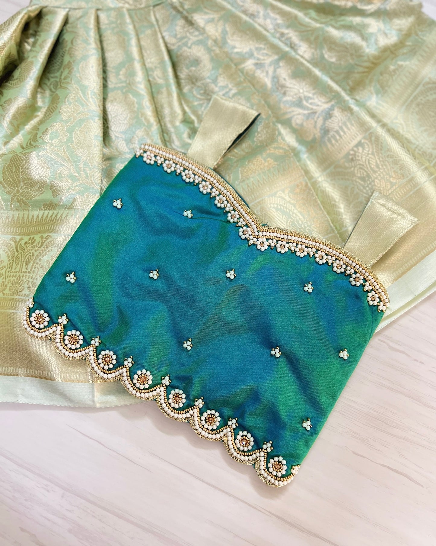 Carribean Teal Pearl Embellished Intricate Aari Work Lehenga Set