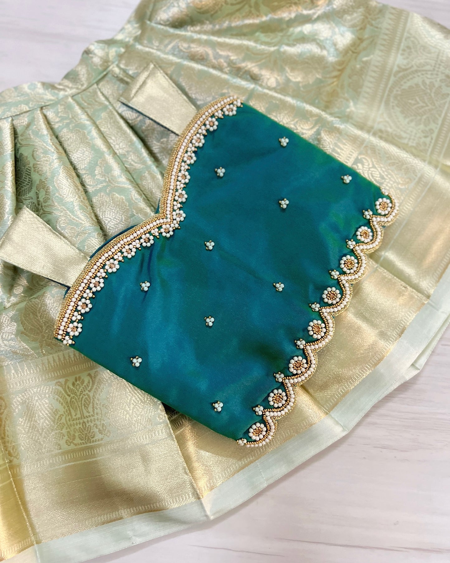 Carribean Teal Pearl Embellished Intricate Aari Work Lehenga Set