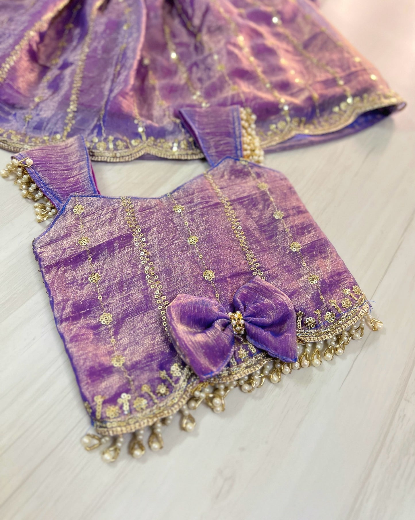 Rich Lilac Embroidered Pearl Embellished Lehenga Set