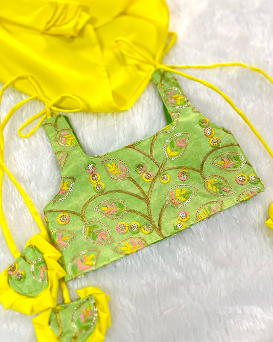 Pistachio Green Embroidered Top And Bright Yellow Dhoti Skirt