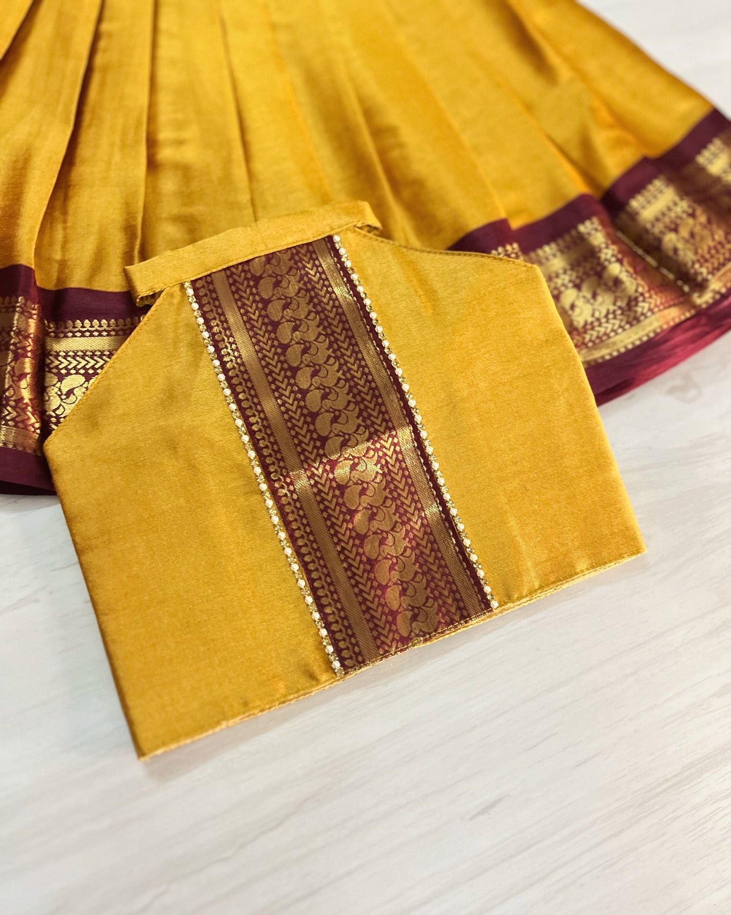 Mustard Yellow With Vintage Maroon Halter Neck Lehenga Set