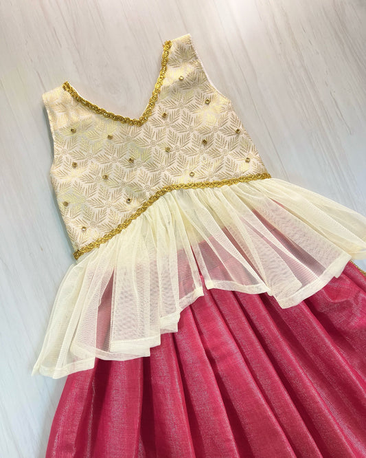 Rich Brocade Gold And Pink Netted Unique Lehenga Set