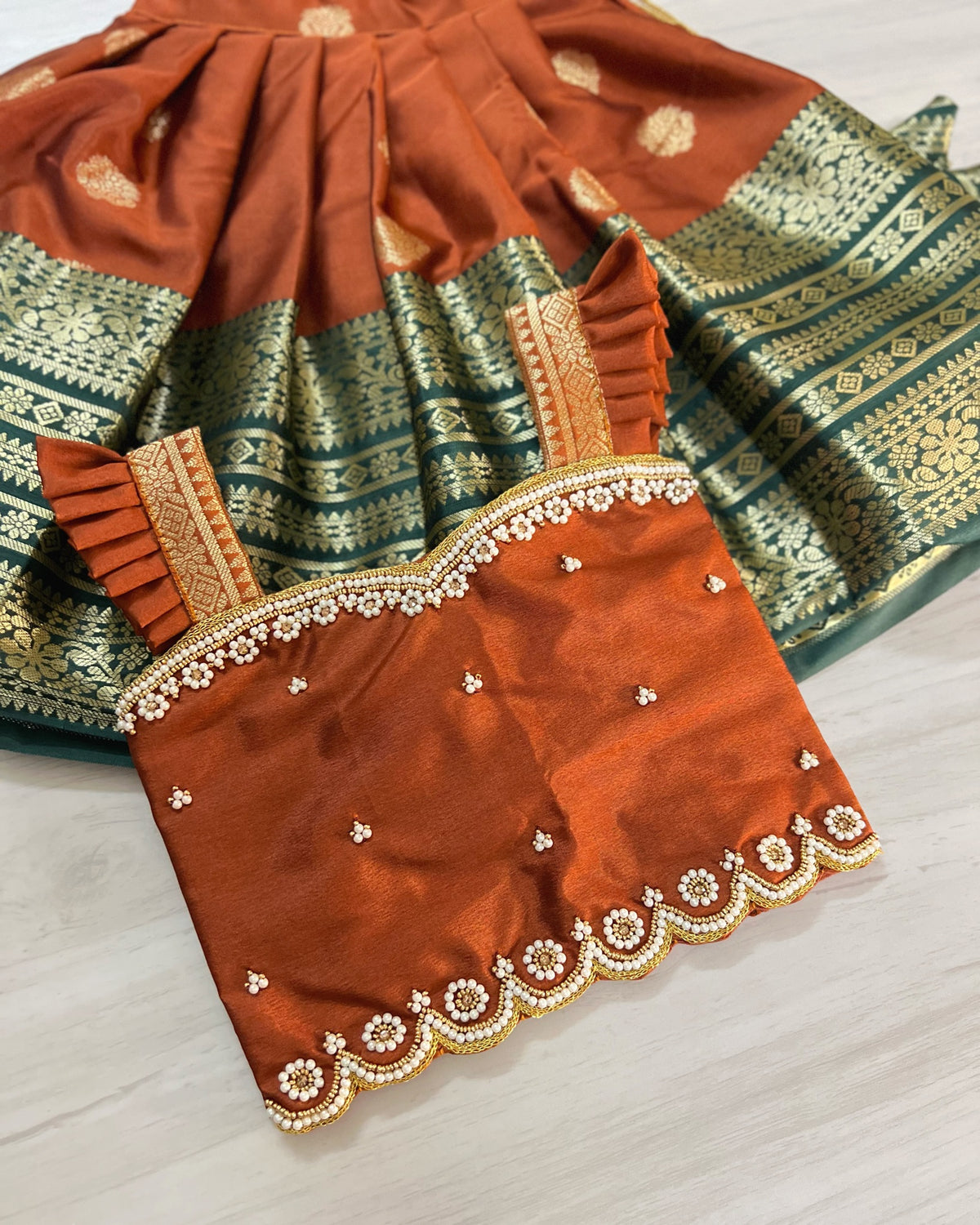 Chestnut Brown With Broad Forest Green Border Aari Work Lehenga Set
