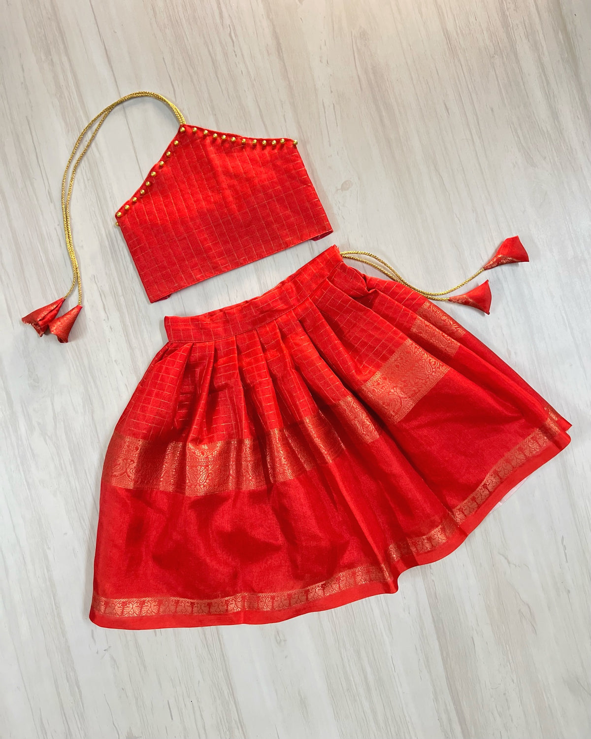 Chili Red Halter Neck Golden Pearls Silk Lehenga Set