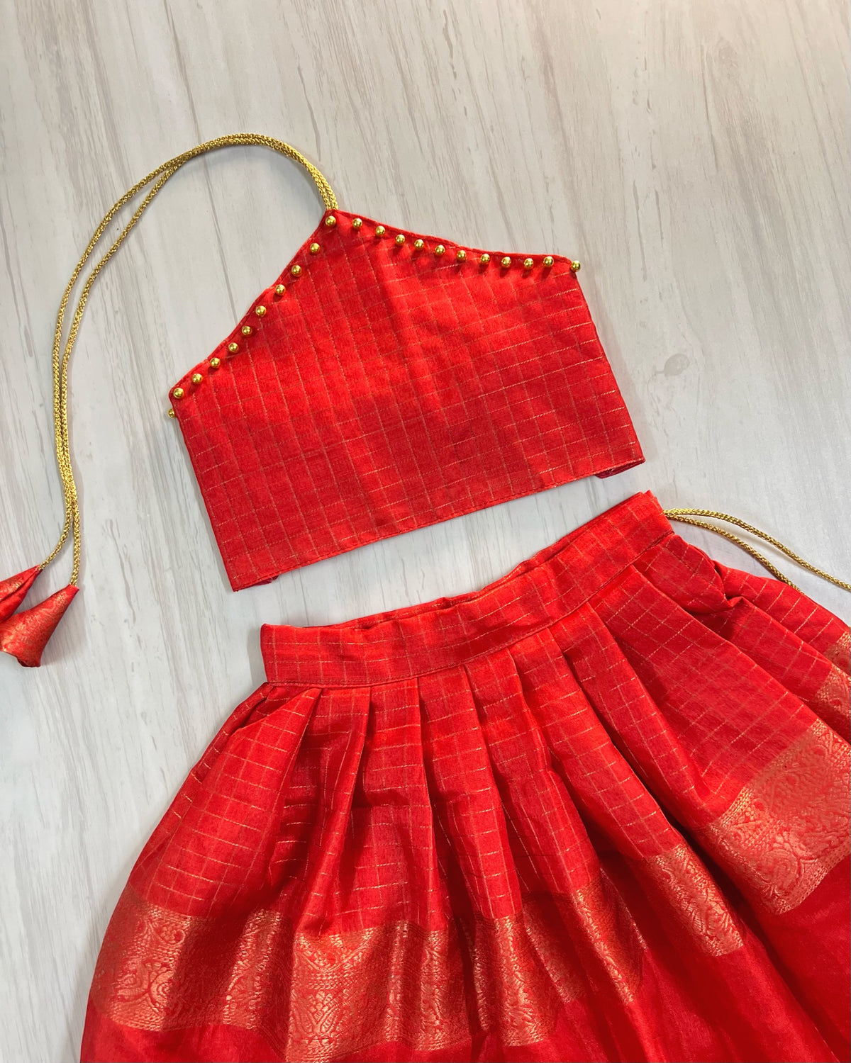 Chili Red Halter Neck Golden Pearls Silk Lehenga Set