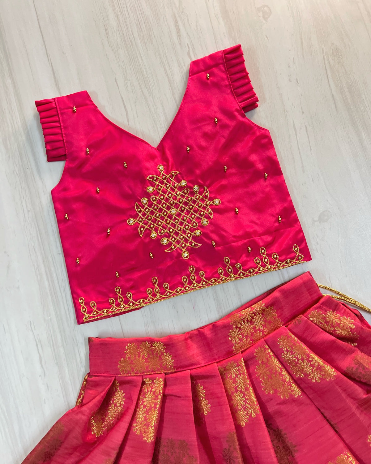Velvety Magenta Temple Kolam Aari Work Traditional Lehenga Set