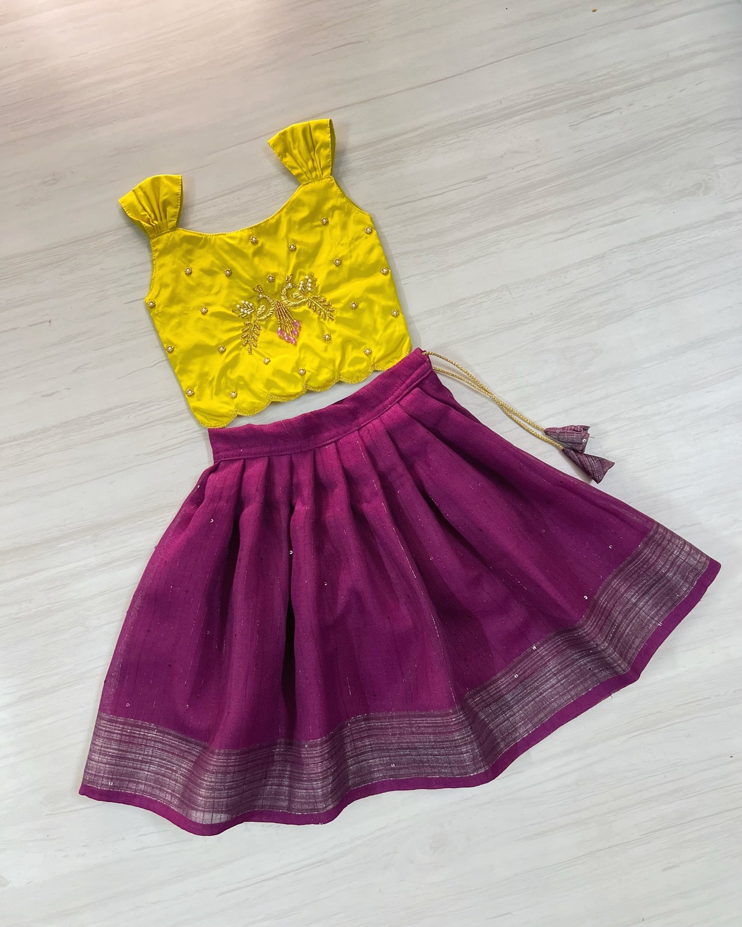 Saffron Yellow Peacock Embroidered Aari Work Cute Top With Plum Lehenga Set | The Silkberry