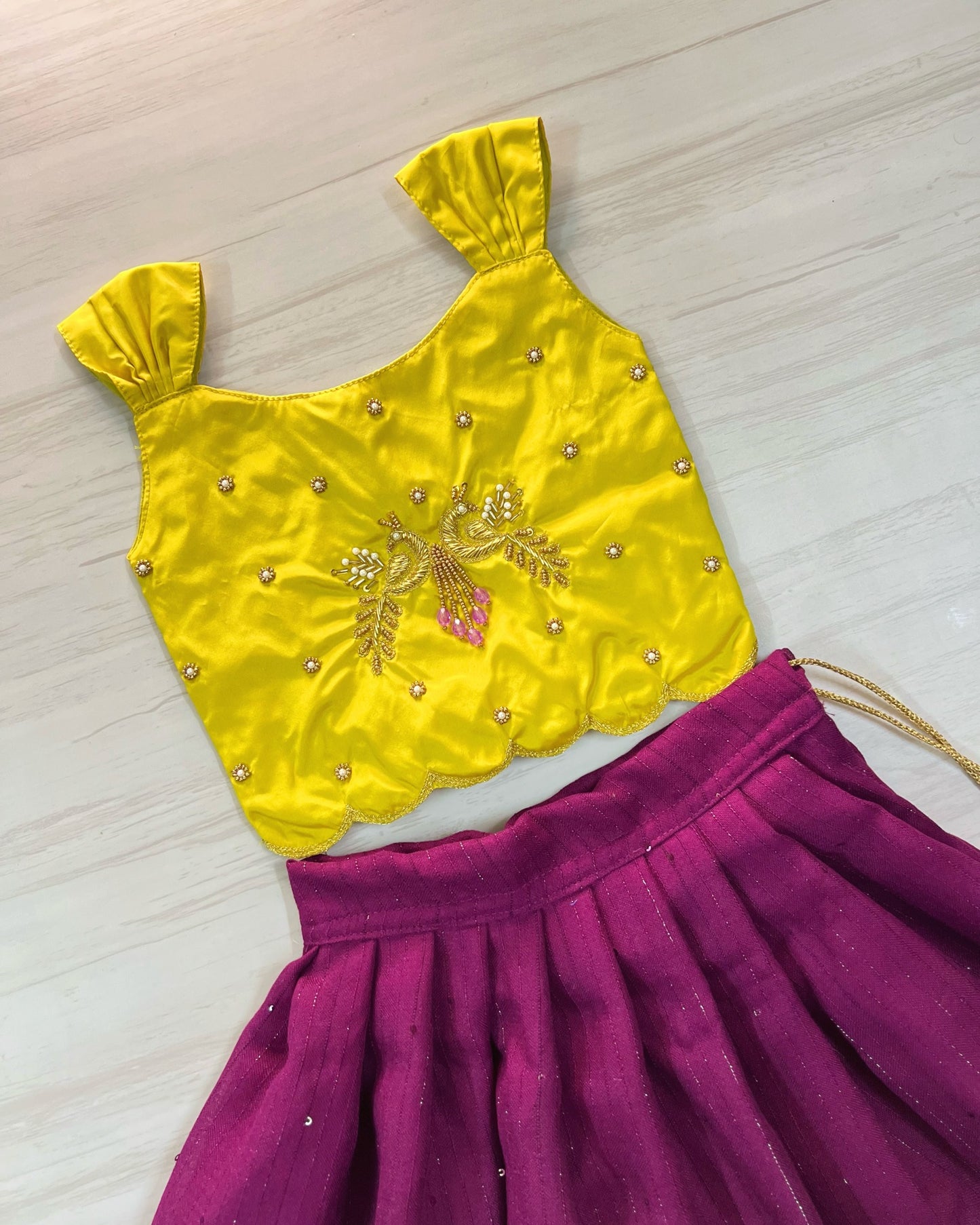 Saffron Yellow Peacock Embroidered Aari Work Cute Top With Plum Lehenga Set | The Silkberry