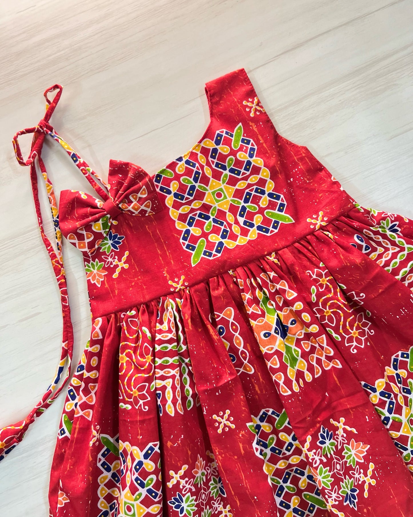 Tomato Red Kolam Design One Side Tie-Up Frock | The Silkberry