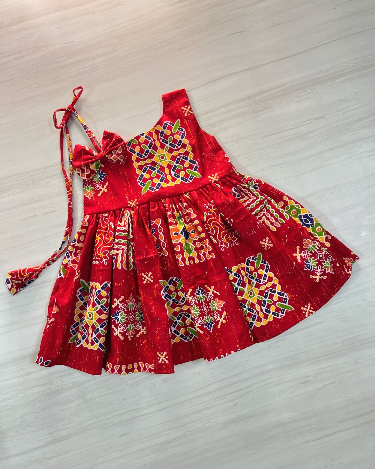 Tomato Red Kolam Design One Side Tie-Up Frock | The Silkberry